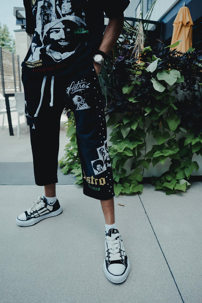 Astro Exotics “Built From Struggle” Studded Capri Sweatpants – Black